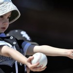 Herny Smyth, 3, of Spooner, Wis., waits for an autograph before the Milwaukee Brewers-Chicago White Sox spring training baseball game in Phoenix, Wednesday, March 11, 2009. (AP Photo/Chris Carlson)

