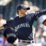 Seattle Mariners opener Brandon Morrow delivers a pitch during the second inning of a spring training baseball game against the Texas Rangers, Sunday, March 1, 2009, in Surprise, Ariz. Seattle won the game 13-6. (AP Photo/Charlie Riedel)