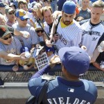 Milwaukee Brewers first baseman Prince Fielder signs autographs before their spring training baseball game with the Chicago Cubs in Maryvale, Az., Saturday, March 7, 2009. (AP Photo/Chris Carlson)