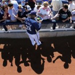 Milwaukee Brewers first baseman Prince Fielder signs autographs before a spring training baseball game against the Oakland Athletics Wednesday, Feb. 25, 2009, in Phoenix. (AP Photo/Morry Gash)