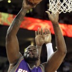 Phoenix Suns' Shaquille O'Neal goes up for a dunk against the Golden State Warriors during the first half of an NBA basketball game Sunday, March 15, 2009, in Oakland, Calif. (AP Photo/Ben Margot)