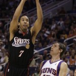 Philadelphia 76ers' Andre Miller (7) gets a shot off over Phoenix Suns' Steve Nash in the first quarter of an NBA basketball game Wednesday, March 18, 2009, in Phoenix. (AP Photo/Ross D. Franklin)
