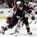 The Anaheim Ducks' James Wisniewski brings the puck down the ice during the first period of an NHL hockey game against the Phoenix Coyotes in Anaheim, Calif., on Sunday, March 22, 2009. (AP Photo/Branimir Kvartuc)