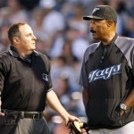 Toronto Blue Jays manager Cito Gaston, right, talks with home plate umpire Marty Foster during the second inning of the Blue Jays spring training baseball game against the New York Yankees at Steinbrenner Field in Tampa, Fla., Thursday, March 19, 2009. (AP Photo/Kathy Willens)