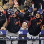 Japan's Hiroyuki Nakajima (6) is congratulated after scoring on an RBI single by Michihiro Ogasawara during the third inning of the final of the World Baseball Classic, against Japan in Los Angeles, Monday, March 23, 2009. (AP Photo/Mark J. Terrill)
