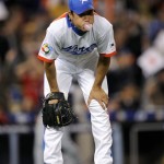 South Korea starting pitcher Bong Jung-keun pauses after giving up an RBI single to Japan's Michihiro Ogasawara during the third inning of the final of the World Baseball Classic in Los Angeles, Monday, March 23, 2009. (AP Photo/Mark J. Terrill)