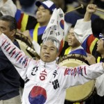 A South Korean fan cheers on his team during the championship game of the World Baseball Classic against Japan on Monday, March 23, 2009, in Los Angeles. (AP Photo/Ted S. Warren)