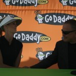 Go Daddy CEO and founder Bob Parsons welcomes LPGA golfer Anna Rawson as the newest Go Daddy Girl, Tuesday, March 24, 2009. (Tyler Bassett/KTAR)