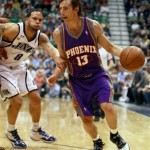 Phoenix Sun's Steve Nash, right, drives past Utah Jazz's Deron Williams in the first half of an NBA basketball game in Salt Lake City, Saturday, March 28, 2009. (AP Photo/George Frey)