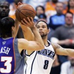 Utah Jazz's Deron Williams, right, attempts to block the shot of Phoenix Sun's Steve Nash in the second half of an NBA basketball game in Salt Lake City, Saturday, March 28, 2009. The Jazz beat the Suns 104-99 in overtime. (AP Photo/George Frey)