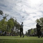 Angel Cabrera, right, of Argentina watches fellow countryman Andres Romero's drive on the seventh tee during his practice round for the Masters golf tournament at the Augusta National Golf Club in Augusta, Ga., Monday, April 6, 2009. (AP Photo/Carlie Riedel)