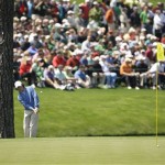 Rory McIlroy of Northern Ireland chips onto the 14th green during his practice round at the Masters golf tournament at the Augusta National Golf Club in Augusta, Ga., Monday, April 6, 2009. (AP Photo/Charlie Riedel)