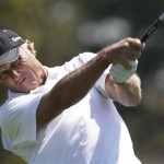 Greg Norman of Australia watches his drive during his practice round for the Masters golf tournament at the Augusta National Golf Club in Augusta, Ga., Monday, April 6, 2009. (AP Photo/Rob Carr)