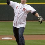 Recording artist Nick Lachey throws out the first pitch prior to a baseball game between the Cincinnati Reds and New York Mets, Monday, April 6, 2009, in Cincinnati. (AP Photo/Al Behrman)
