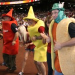 Yoda, Doug and Wolf running in place in the Hot Dog Race, Wednesday, April 8, 2009. Doug & Wolf, and their producer Ryan Lindsay lost the Bracket Beatdown to Gambo & Ash, and their producer Eric Sorenson. For losing, they had to race in the Hot Dog Race after the second inning of a Diamondbacks game. (Tyler Bassett/KTAR)
