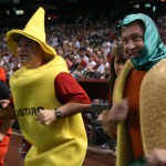 Yoda, Doug and Wolf wait to see the results of the Hot Dog Race, Wednesday, April 8, 2009. Doug & Wolf, and their producer Ryan Lindsay lost the Bracket Beatdown to Gambo & Ash, and their producer Eric Sorenson. For losing, they had to race in the Hot Dog Race after the second inning of a Diamondbacks game. (Tyler Bassett/KTAR)