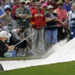 Jim Furyk chips out of a bunker on the first hole during the second round of the Masters golf tournament at the Augusta National Golf Club in Augusta, Ga., Friday, April 10, 2009. (AP Photo/Morry Gash)