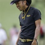 Shingo Katayama of Japan reacts after missing a putt on the seventh green during the second round of the Masters golf tournament at the Augusta National Golf Club in Augusta, Ga., Friday, April 10, 2009. (AP Photo/Morry Gash)