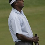Vijay Singh of Fiji reacts after his putt on the 18th hole during the second round of the Masters golf tournament at the Augusta National Golf Club in Augusta, Ga., Friday, April 10, 2009. (AP Photo/Morry Gash)