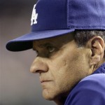 Los Angeles Dodgers manager Joe Torre watches game action against the Arizona Diamondbacks in the third inning of a baseball game Friday, April 10, 2009, in Phoenix. (AP Photo/Paul Connors)