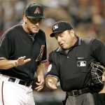 Arizona Diamondbacks manager Bob Melvin argues a call with home plate umpire Charlie Reliford against the Los Angeles Dodgers during the sixth inning of a baseball game Saturday, April 11, 2009 in Phoenix. (AP Photo/Matt York)