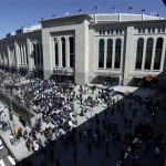 Fans arrive at the new Yankee Stadium for the first regular season baseball game on Thursday, April 16, 2009, in New York. The Yankees face the Cleveland Indians in their home opener. (AP Photo/Julie Jacobson)