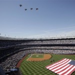 Fighter Jets fly over the new Yankee Stadium during pregame ceremonies before the first regular season baseball game on Thursday, April 16, 2009, in New York. The Yankees face the Cleveland Indians in the home-opener. (AP Photo/Kathy Willens)