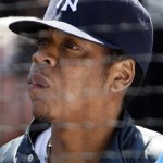 Hip hop artist Jay-Z watches the New York Yankees play the Cleveland Indians in the Yankees home-opening baseball game at the new Yankee Stadium on Thursday, April 16, 2009, in New York. (AP Photo/Kathy Willens)