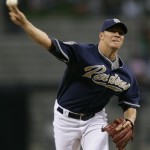San Diego Padres pitcher Jake Peavy delivers during the second inning of a baseball game against the Arizona Diamondbacks Wednesday, May 6, 2009 in San Diego. (AP Photo/Denis Poroy)