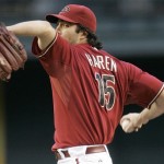 Arizona Diamondbacks pitcher Dan Haren delivers a pitch against the Cincinnati Reds during the first inning of a baseball game in Phoenix, Tuesday, May 12, 2009. (AP Photo/Matt York)