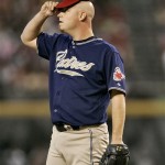 San Diego Padres pitcher Chad Gaudin adjusts his cap after giving up his fifth run of the third inning of a baseball game against the Arizona Diamondbacks Monday, May 25, 2009, in Phoenix. (AP Photo/Matt York)