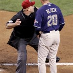 Home plate umpire Eric Cooper throws San Diego Padres manager Bud Black out of the game against the Arizona Diamondbacks during the sixth inning of a baseball game Monday, May 25, 2009, in Phoenix. (AP Photo/Matt York)