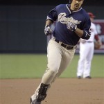 San Diego Padres' Adrian Gonzalez rounds third base after hitting a two-run home run off Arizona Diamondbacks pitcher Billy Buckner in the first inning of a baseball game Wednesday, May 27, 2009, in Phoenix. Gonzalez had three runs batted in as the Padres won 8-5. (AP Photo/Paul Connors)