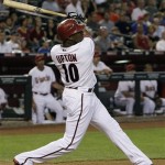Arizona Diamondbacks' Justin Upton connects for a home run against the San Francisco Giants in the third inning of a baseball game Thursday, June 11, 2009, in Phoenix. (AP Photo/Ross D. Franklin)