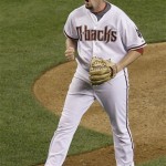 Arizona Diamondbacks' Chad Qualls celebrates the final out against the San Francisco Giants to end the ninth inning of a baseball game Thursday, June 11, 2009, in Phoenix. The Diamondbacks defeated the Giants 2-1. (AP Photo/Ross D. Franklin)
