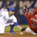 Arizona Diamondbacks' Ryan Roberts (14) is tagged by Kansas City Royals shortstop Tony Pena as he is caught stealing second during the eighth inning of a baseball game Tuesday, June 16, 2009, in Kansas City, Mo. Kansas City won the game 5-0. (AP Photo/Charlie Riedel)