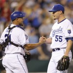 Kansas City Royals starting pitcher Gil Meche (55) celebrates with catcher Miguel Olivo after a baseball game against the Arizona Diamondbacks on Tuesday, June 16, 2009, in Kansas City, Mo. Meche pitched a complete game shutout as the Royals won the game 5-0. (AP Photo/Charlie Riedel)