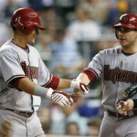 Arizona Diamondbacks' Gerardo Parra, left, is congratulated by teammate Miguel Montero after hitting a home run in the sixth inning of a baseball game against the Kansas City Royals, Thursday, June 18, 2009, Kansas City, Mo. The Diamondbacks won 12-5. (AP Photo/Ed Zurga)