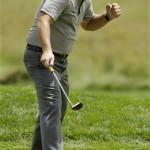 Phil Mickelson pumps his fist after a birdie putt on the 17th green during the first round of the U.S. Open Golf Championship at Bethpage State Park's Black Course in Farmingdale, N.Y., Friday, June 19, 2009. (AP Photo/Morry Gash)