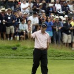 Rory Sabbatini of South Africa acknowledges the gallery after his putt on the 16th green during the first round of the U.S. Open Golf Championship at Bethpage State Park's Black Course in Farmingdale, N.Y., Friday, June 19, 2009. Play was suspended on Thursday because of inclement weather. (AP Photo/Matt Slocum)