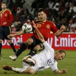 Spain's Cesc Fabregas, top, vies for the ball with USA's Michael Bradley during their Confederations Cup semifinal soccer match at Free State Stadium in Bloemfontein, South Africa, Wednesday, June 24, 2009. (AP Photo/Paul Thomas)