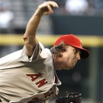 Los Angeles Angels' Jered Weaver throws against the Arizona Diamondbacks in the first inning of a baseball game Friday, June 26, 2009, in Phoenix. (AP Photo/Ross D. Franklin)