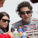 Danica Patrick talks with Dario Franchitti, of Scotland, before the IndyCar Series' Iowa Corn Indy 250 auto race Sunday, June 21, 2009, at the Iowa Speedway in Newton, Iowa. Franchitti won the race, Patrick finished in ninth, and Helio Castroneves, left, of Brazil, finished in seventh. (AP Photo/Charlie Neibergall)