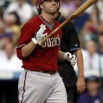 Arizona Diamondbacks' Mark Reynolds reacts after a called third strike against the Colorado Rockies in the second inning of a baseball game in Denver on Tuesday, July 21, 2009. (AP Photo/David Zalubowski)
