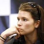 IndyCar driver Danica Patrick listens to a question during a news conference at the Kentucky Speedway in Sparta, Ky., Thursday, July 30, 2009. (AP Photo/Ed Reinke)