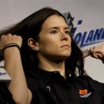IRL race car driver Danica Patrick listens to a question during a news conference at the Chicagoland Raceway Thursday, Aug. 27, 2009 in Joliet, Ill. Patrick isn't ready to address her future with Andretti Green Racing or the IndyCar series, sidestepping questions about her expiring contract. (AP Photo/Charles Rex Arbogast)