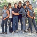 FILE - In this 1983 file photo provided by Warner Bros., cast members from the 1983 film "The Outsiders," from left, Emilio Estevez, Rob Lowe, C. Thomas Howell, Matt Dillon, Ralph Macchio, Patrick Swayze and Tom Cruise, are shown. Swayze's publicist Annett Wolf says the 57-year-old "Dirty Dancing" actor died Monday, Sept. 14, 2009, after a nearly two-year battle with pancreatic cancer. (AP Photo/Warner Bros., file)
