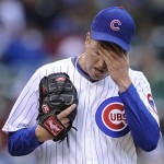 Chicago Cubs starting pitcher Tom Gorzelanny reacts to giving up four runs to the Arizona Diamondbacks during the third inning during a baseball game at Wrigley Field in Chicago, Friday, Oct. 2, 2009. (AP Photo/Paul Beaty)