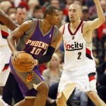 Phoenix Suns Leandro Barbosa (10), of Brazil, looks to pass as Portland Trail Blazers Steve Blake (2) defends in the second half of their NBA preseason basketball game Wednesday, Oct. 14, 2009, in Portland, Ore. The Suns defeated the Trail Blazers 110-104. (AP Photo/Rick Bowmer)