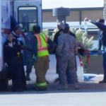 In this image made from Associated Press Television video, emergency personnel take a wounded person on a stretcher to an awaiting ambulance at the scene at the U.S. Army base in Fort Hood Texas where a soldier opened fire, unleashing a stream of gunfire that left at least 12 people dead and at least 31 wounded. Authorities killed the gunman, and apprehended two other soldiers suspected in the attack. (AP Photo/APTN)